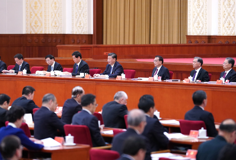 中國共產(chǎn)黨第十九屆中央委員會第五次全體會議，于2020年10月26日至29日在北京舉行。這是習近平、李克強、栗戰(zhàn)書、汪洋、王滬寧、趙樂際、韓正等在主席臺上。新華社記者 殷博古 攝